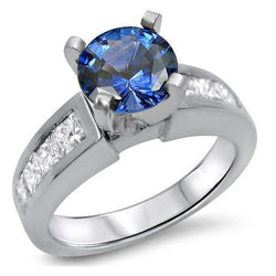 Anello con zaffiro blu di Ceylon 4 carati e diamanti in oro bianco 14 carati