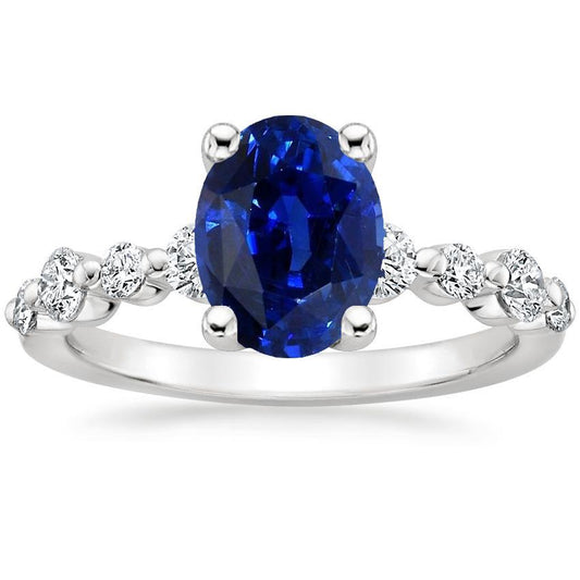 Anello con zaffiro blu e diamanti a forma ovale 4.50 carati Gioielli da donna - harrychadent.it