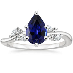 Anello con zaffiro blu naturale e marquise. diamanti rotondi 6.75 carati
