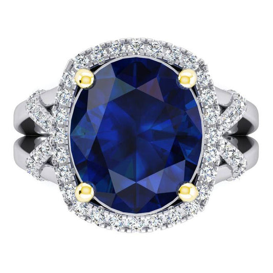 Anello con zaffiro blu ovale e diamanti a taglio rotondo 7,80 carati