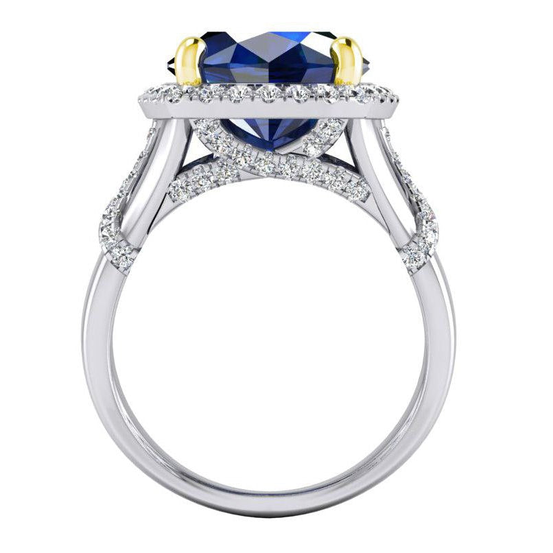 Anello con zaffiro blu ovale e diamanti a taglio rotondo 7,80 carati