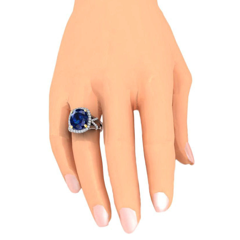Anello con zaffiro blu ovale e diamanti a taglio rotondo 7,80 caratiAnello con zaffiro blu ovale e diamanti a taglio rotondo 7,80 carati