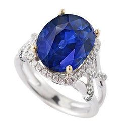 Anello con zaffiro blu ovale e diamanti a taglio rotondo 7,80 carati