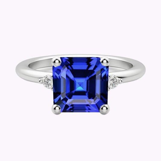 Anello con zaffiro blu rotondo piccolo diamante 3 pietre taglio Asscher 2.75 carati - harrychadent.it