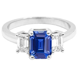 Anello con zaffiro blu smeraldo da 2,50 carati e diamanti tre pietre