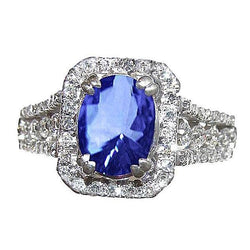 Anello con zaffiro dello Sri Lanka ovale da 5,70 carati e diamanti tondi in oro bianco 14 carati