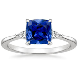 Anello da donna con 3 pietre di pera. diamante e cuscino. zaffiro blu 2.50 carati