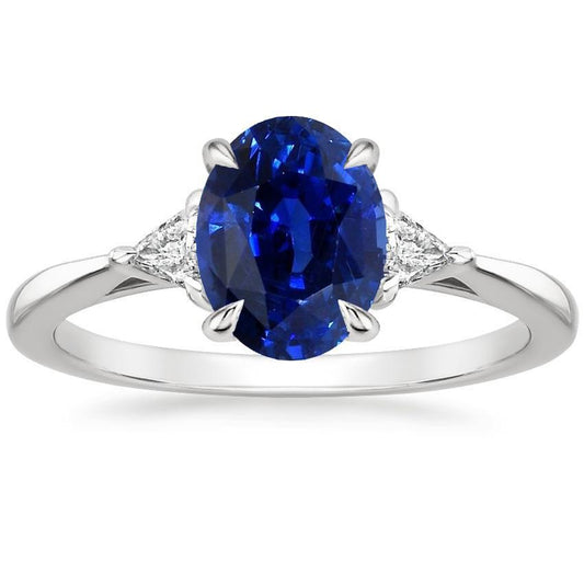 Anello da donna con 3 pietre ovale blu zaffiro e diamante taglio trilioni 3 carati - harrychadent.it