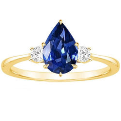 Anello da donna con 3 pietre. diamante rotondo e zaffiro di Ceylon a pera 6.20 carati