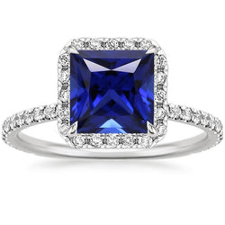 Anello da donna con diamante aureola con accenti di zaffiro blu principessa 6 carati
