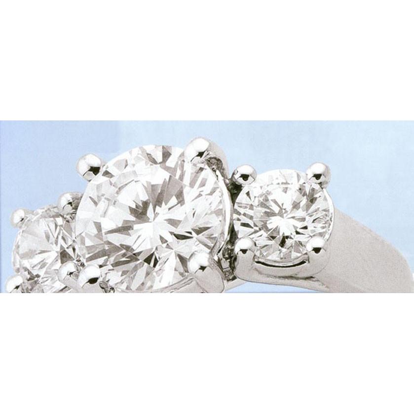 Anello da donna con tre pietre in oro bianco con diamanti 2.55 carati - harrychadent.it