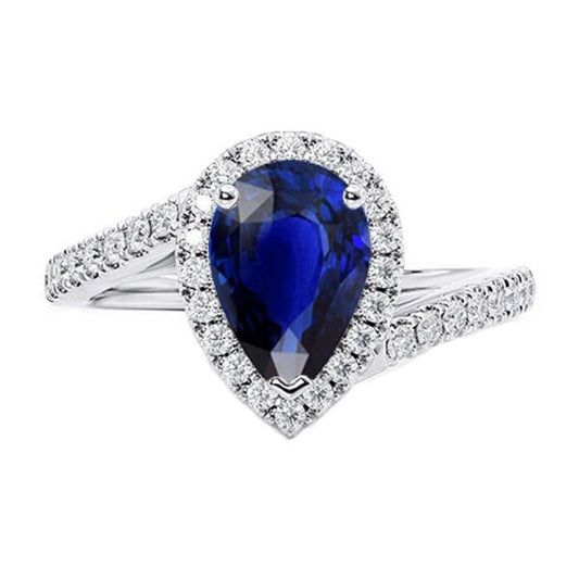 Anello di fidanzamento aureola con zaffiro blu pera e diamanti 4.50 carati - harrychadent.it