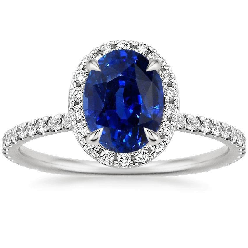 Anello di fidanzamento con diamante Halo con zaffiro blu ovale accentato 6.20 carati - harrychadent.it