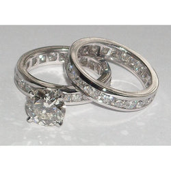 Anello di fidanzamento con diamante da 6.01 carati e set di gruppo musicale