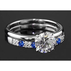 Anello di fidanzamento con diamante rotondo da 2.75 carati e zaffiro blu a 4 punte
