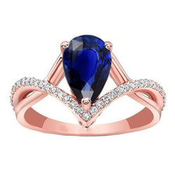 Anello di fidanzamento con diamante rotondo e zaffiro blu ovale. oro 4.50 carati