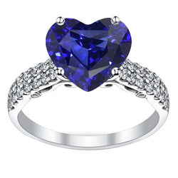 Anello di fidanzamento con diamante rotondo e zaffiro di Ceylon. oro 4.50 carati 14K