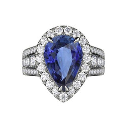 Anello di fidanzamento con pera aureola con zaffiro blu e diamanti 3 carati