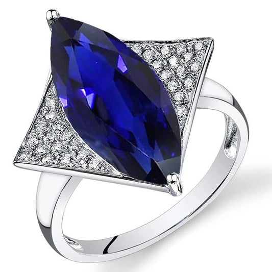 Anello di fidanzamento con zaffiro blu marchesa e piccoli diamanti 5.50 carati - harrychadent.it