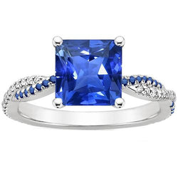 Anello di fidanzamento con zaffiro blu taglio principessa e diamanti. oro 4.70 carati