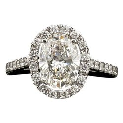 Anello di fidanzamento da donna con diamante ovale centrale da 3,25 carati e oro bianco 14 carati