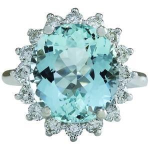Anello di fidanzamento in oro bianco con acquamarina rotonda e diamanti da 11.50 ct - harrychadent.it