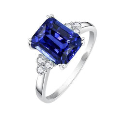 Anello di smeraldo con diamante blu intenso con zaffiro 3 carati in oro 14 carati