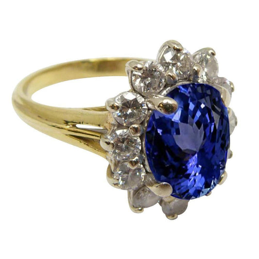 Anello fantasia con tanzanite a taglio rotondo da 2.25 carati e diamanti 14k Two Tone Gold - harrychadent.it
