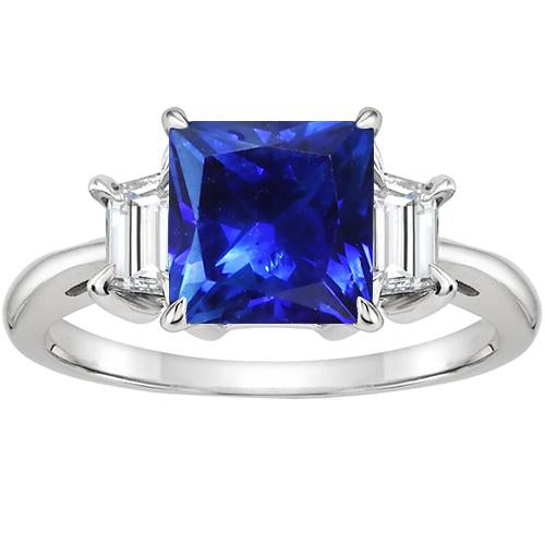 Anello in oro 3 pietre con zaffiro blu principessa e diamanti trapezoidali 4 carati - harrychadent.it