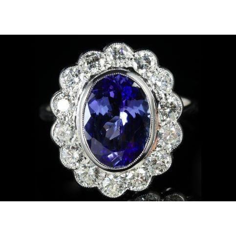 Anello in oro bianco 14 carati con castone ovale da 5.15 ct con tanzanite e diamanti - harrychadent.it