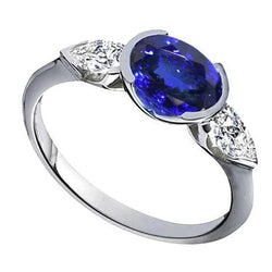 Anello in oro bianco 14k con diamante tanzanite ovale da 3 ct e 3 pietre