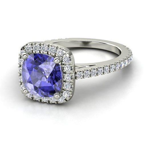 Anello in oro bianco 14 kt con tanzanite blu da 4.50 ct con diamanti - harrychadent.it