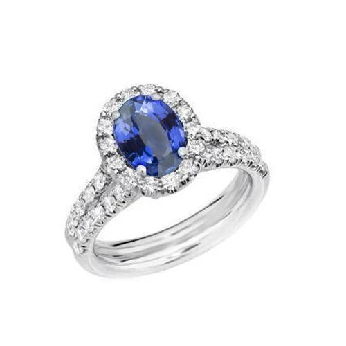 Anello in oro bianco 14 kt con zaffiro blu ovale e diamanti rotondi da 3 ct - harrychadent.it