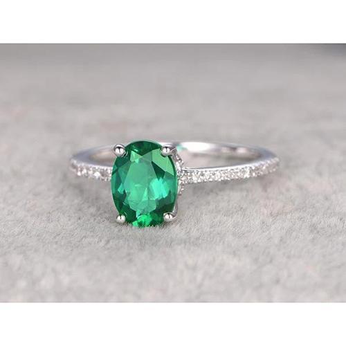 Anello in oro bianco 14K con smeraldo e diamanti taglio ovale verde da 4.25 carati - harrychadent.it