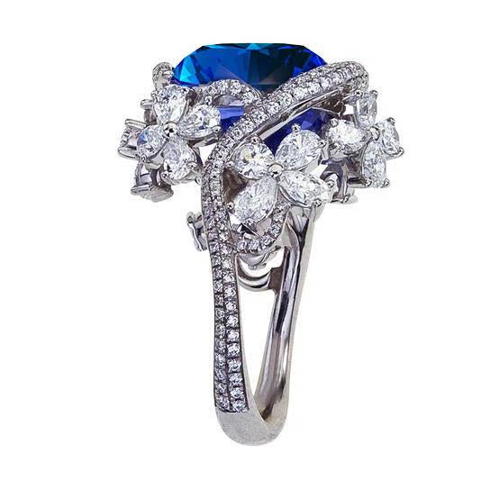 Anello in oro bianco 14K con zaffiro blu taglio pera e diamanti 9.50 carati - harrychadent.it