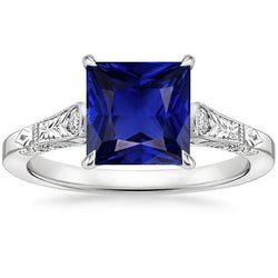 Anello in oro bianco con 3 pietre di diamanti e zaffiro blu principessa 5.25 carati