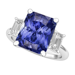 Anello in oro bianco con 3 pietre. smeraldo. diamante. zaffiro blu radiante. 5 carati