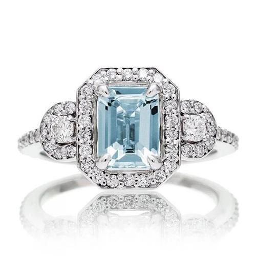 Anello in oro bianco con acquamarina taglio smeraldo da 6.25 ct e piccoli diamanti - harrychadent.it