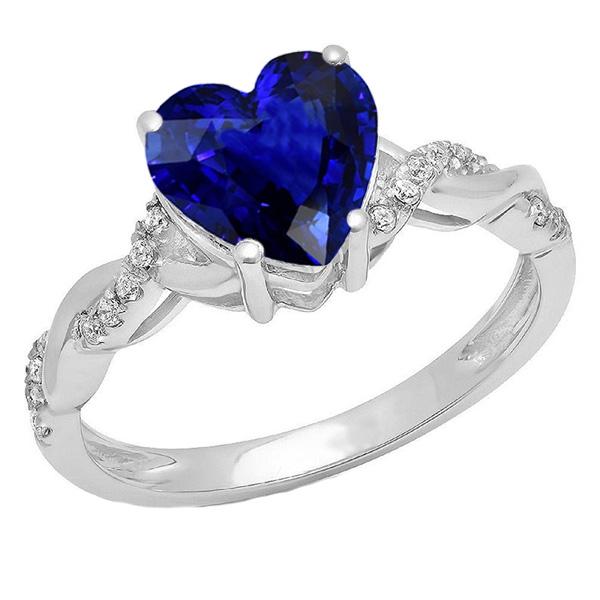 Anello in oro bianco con diamante a cuore. zaffiro blu. stile infinito. 3.50 carati - harrychadent.it