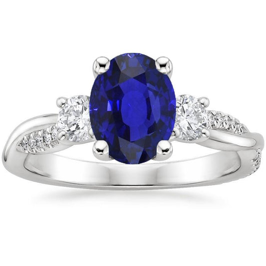 Anello in oro bianco con diamanti. zaffiro blu ovale. 3 pietre. stile 6.50 carati - harrychadent.it