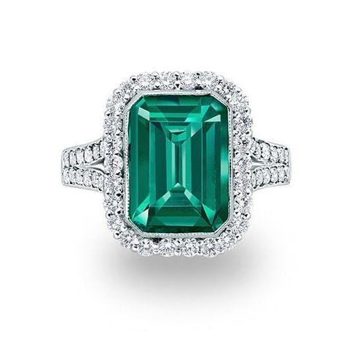 Anello in oro bianco con pietre preziose verde smeraldo e diamanti 5.80 carati - harrychadent.it