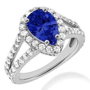 Anello in oro bianco con tanzanite taglio pera blu da 1.85 ct con diamanti - harrychadent.it