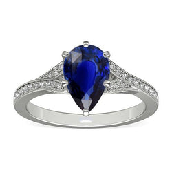 Anello in oro bianco con zaffiro dello Sri Lanka. pera e diamanti tondi 4 carati