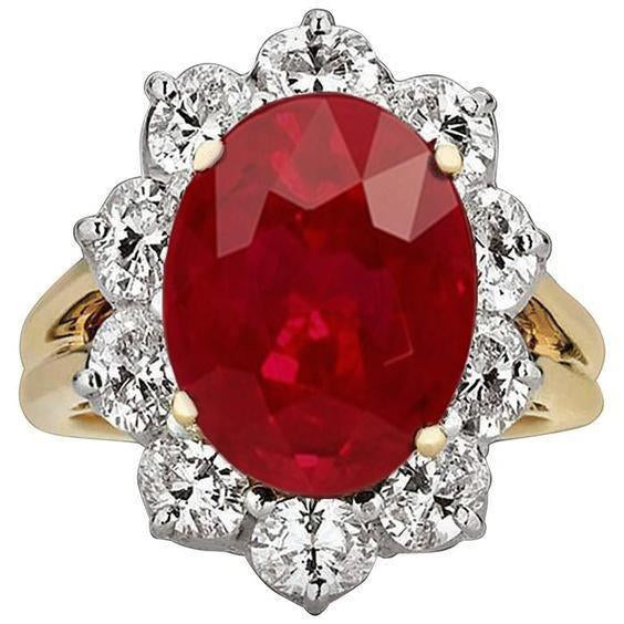 Anello in oro bicolore con rubini a taglio brillante da 3.50 ct e diamanti - harrychadent.it