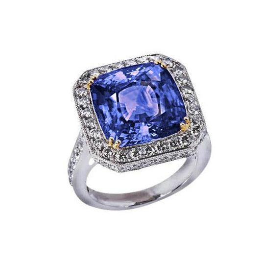 Anello in oro bicolore con tanzanite e diamanti. 4.25 carati. stile vintage - harrychadent.it