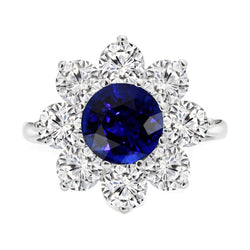 Anello in oro con diamante. anello con zaffiro rotondo blu. stile fiore 4.50 carati