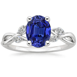 Anello in oro con pietre preziose Zaffiro blu ovale con accenti marquise 4 carati