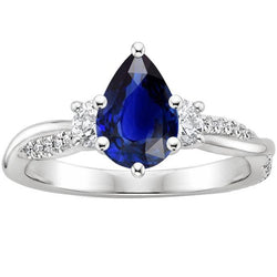 Anello in oro con pietre preziose. pera. zaffiro blu e diamanti rotondi 5.50 carati