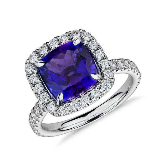 Anello in oro con tanzanite a cuscino da 5.50 ct con diamanti rotondi - harrychadent.it