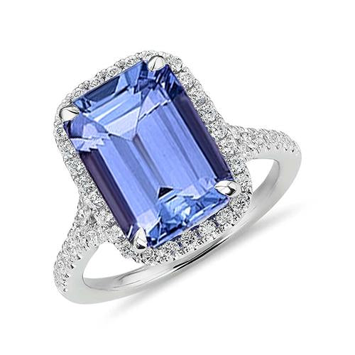 Anello in oro con tanzanite a forma di smeraldo da 8.75 ct con diamanti rotondi - harrychadent.it